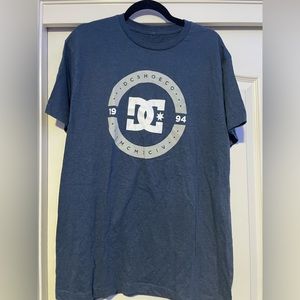 New with tag. Men’s DC shirt size large.
